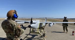 conducts an engine start on the JUMP 20 prior to a launch during the FTUAS capabilities assessment at Fort Riley