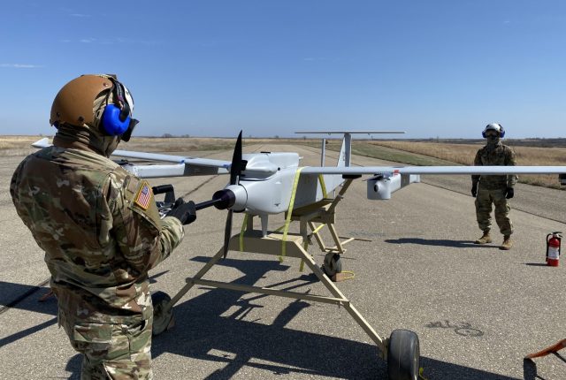 conducts an engine start on the JUMP 20 prior to a launch during the FTUAS capabilities assessment at Fort Riley