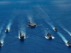 HMA Ships Canberra, Hobart, Stuart, Arunta and Sirius taking part in a trilateral passage in the Philippine Sea with US Navy ships, USS Ronald Reagan, Antietam and Mustin and the Japanese Maritime Self-Defense Force’s Akizuki-class destroyer JS Teruzuki.