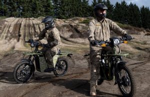 New Zealand soldiers on UBCO electric mopeds