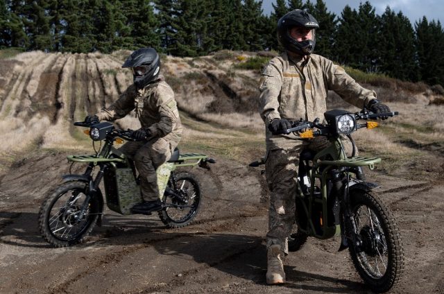 New Zealand soldiers on UBCO electric mopeds