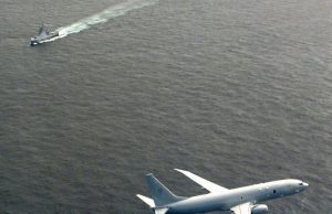 UK Poseidon flying over Russian corvette