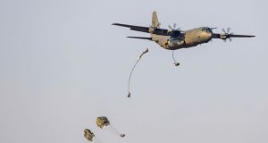 Paratroopers jump from RAF Hercules aircraft over Ukraine