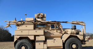 Cougar MRAP with Zeus III laser and robotic arm for UXO removal