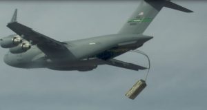 C-17 deploying palletized mock JASSM missiles