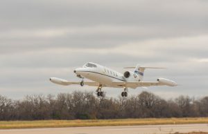 The first C-21A to acquire new “delta fins” takes off Nov. 10, 2020, from Newton City Airport, Kansas