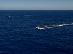 The Los Angeles-class fast-attack submarine USS Asheville (SSN 758), right, and the French Navy Rubis-class nuclear powered submarine (SSN) Émeraude steam in formation off the coast of Guam during a photo exercise. Asheville and Émeraude practiced high-end maritime skills in a multitude of disciplines designed to enhance interoperability between maritime forces. Asheville is one of four forward-deployed submarines assigned to Commander, Submarine Squadron 15