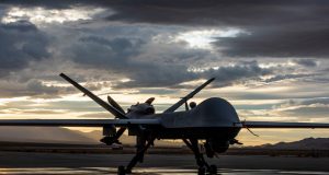 MQ-9 Reaper sits on the flight line as the sun sets at Creech Air Force Base, Nev., Nov. 20, 2019.