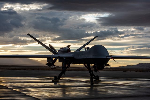MQ-9 Reaper sits on the flight line as the sun sets at Creech Air Force Base, Nev., Nov. 20, 2019.