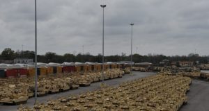 Containers and vehicles await transportation on commercial ships to Europe in support of DEFENDER-Europe 20 February 18, 2020 at the Port of Beaumont, Texas