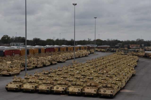Containers and vehicles await transportation on commercial ships to Europe in support of DEFENDER-Europe 20 February 18, 2020 at the Port of Beaumont, Texas