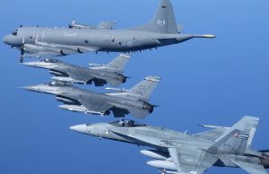 NORAD assets from the US Air Force and Royal Canadian Air Force fly in formation