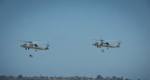 US, Indian MH-60 helicopters flying together during hand-over ceremony on July 16, 2021