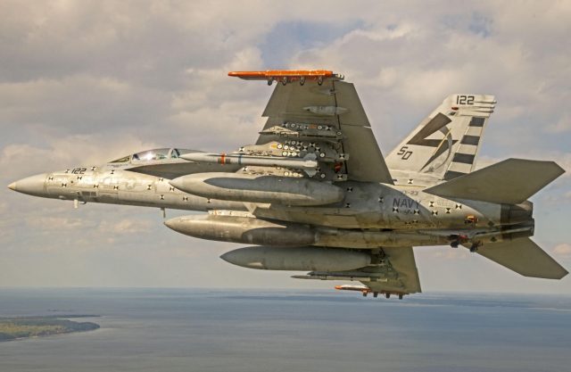F/A-18 E/F flies with an AARGM-ER missile