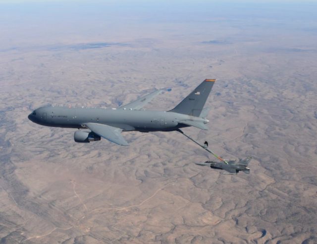A KC-46 Pegasus from the 97th Air Mobility Wing, assigned to the 56th Air Refueling Squadron, Altus Air Force Base (AFB), Oklahoma, refuels an F-16 Fighting Falcon from the 49th Wing, 54th Fighter Group, Holloman AFB, New Mexico, on December 7, 2020.