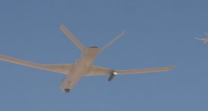 MQ-20 Avengers fly autonomously in tandem