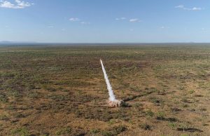A United States Marine Corps M142 High Mobility Artillery Rocket System (HIMARS), part of the Marine Rotational Force - Darwin, fires a guided rocket against targets on Bradshaw Field Training Area in the Northern Territory.