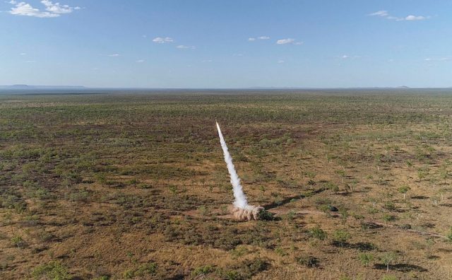 A United States Marine Corps M142 High Mobility Artillery Rocket System (HIMARS), part of the Marine Rotational Force - Darwin, fires a guided rocket against targets on Bradshaw Field Training Area in the Northern Territory.