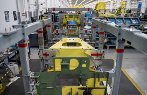 The cabin of an Czech Republic AH-1Z is loaded onto the manufacturing line at the Amarillo Assembly Center to begin production.