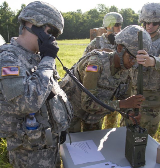 1st Theater Sustainment Command Soldiers learn how to put together a Single Channel Ground and Airborne Radio System (SINCGARS)