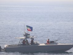 IRGCN fast attack craft near US Navy vessel