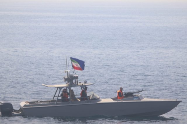 IRGCN fast attack craft near US Navy vessel