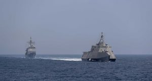LCS and Ticonderoga-class cruiser underway together